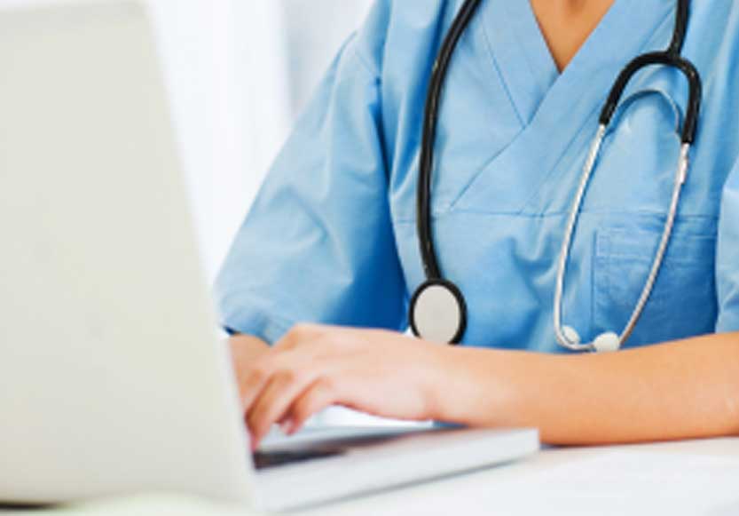 Blog nurse on laptop